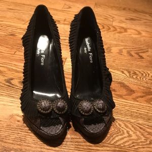 Isabella Fiore snake skin and suede pumps.